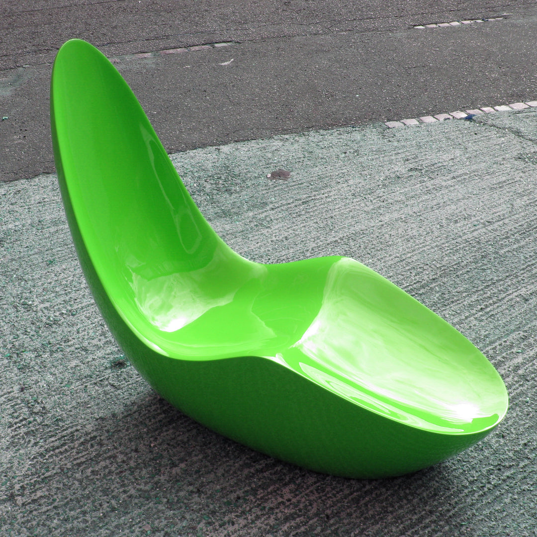 “Caillou Chaise – Metallic Wet Spray” by Ben Rousseau – a sculptural chaise inspired by 1960s grand tourers, hand-shaped in composite with a high-gloss metallic lacquered finish in white, lime, gold, or silver. A fusion of luxury design and form.

