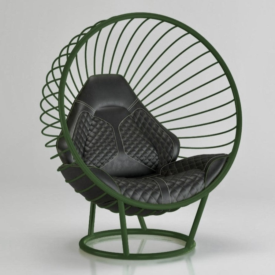 “California Chair – Standing Car Trim” by Ben Rousseau – a sculptural chair with a green powder-coated steel frame and quilted black leather upholstery inspired by 1980s sports car interiors. A bold fusion of craftsmanship, design, and automotive luxury.

