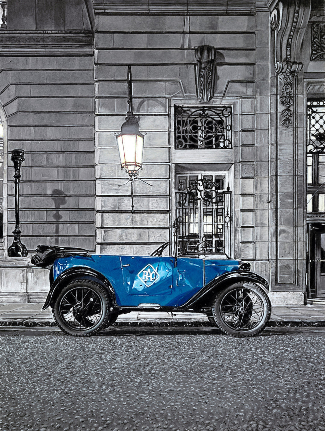 Pastel artwork depicting a 1930 Austin Seven Tourer parked on Pall Mall outside the Royal Automobile Club, with the vivid blue car set against a grand stone façade, illuminated by soft lamplight and surrounded by muted grey architecture, textured paving and evening shadows rendered with fine tonal control and surface detail.