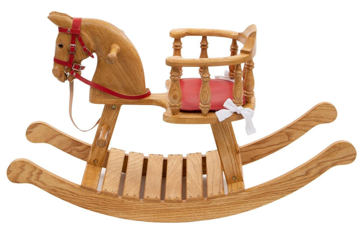 Oak baby rocker with red leather seat, safety rails, and red bridle, designed for toddlers.

