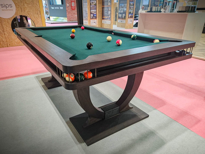 Sir William Bentley Billiards Continental BR 6ft pool table in black stained sapele with bronze detailing and green cloth, featuring sculptural art deco inspired legs.