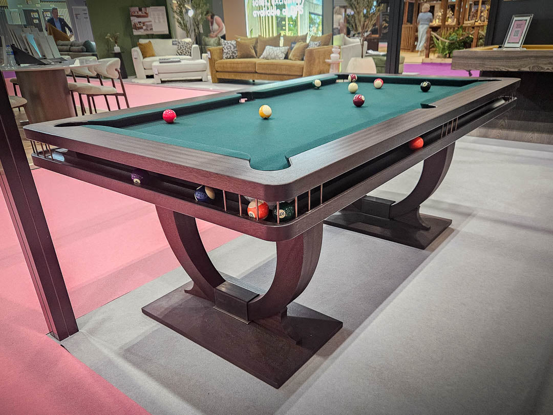 Sir William Bentley Billiards Continental BR 6ft pool table in black stained sapele with bronze detailing and green cloth, featuring sculptural art deco inspired legs.