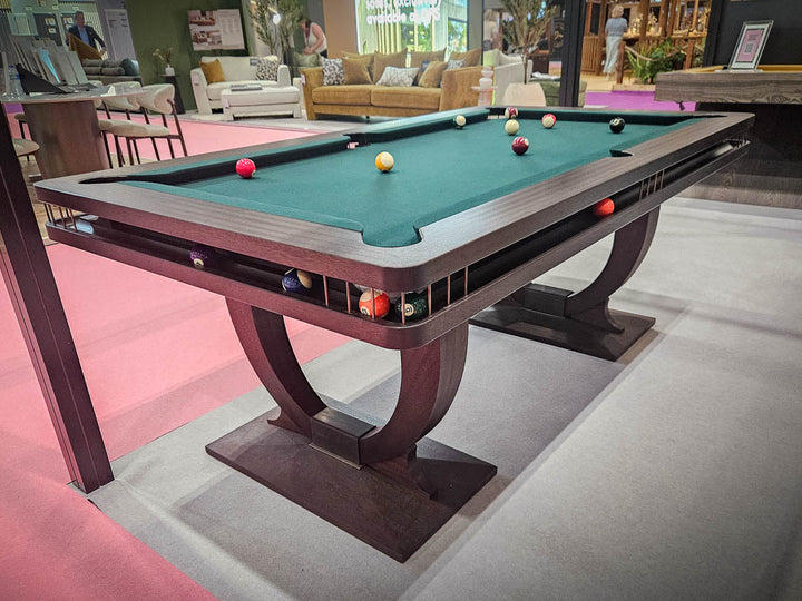Sir William Bentley Billiards Continental BR 6ft pool table in black stained sapele with bronze detailing and green cloth, featuring sculptural art deco inspired legs.
