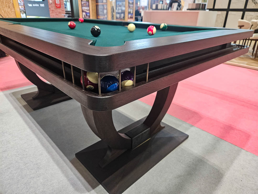 Sir William Bentley Billiards Continental BR 6ft pool table in black stained sapele with bronze detailing and green cloth, featuring sculptural art deco inspired legs.