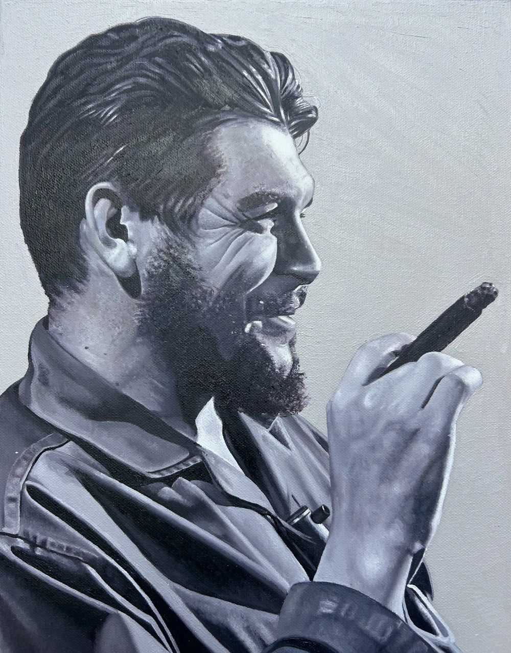 Large-format original oil painting designed as a vintage book cover, featuring a central black-and-white portrait of Che Guevara holding a cigar, surrounded by collage-style scenes of Fidel Castro, revolutionary crowds, and Cuban history. The composition is framed with bold red typography reading “CUBA” and “Patria o Muerte, Venceremos,” set against muted grey tones with a strong blue outer border, evoking political resolve, collective identity, and revolutionary spirit.