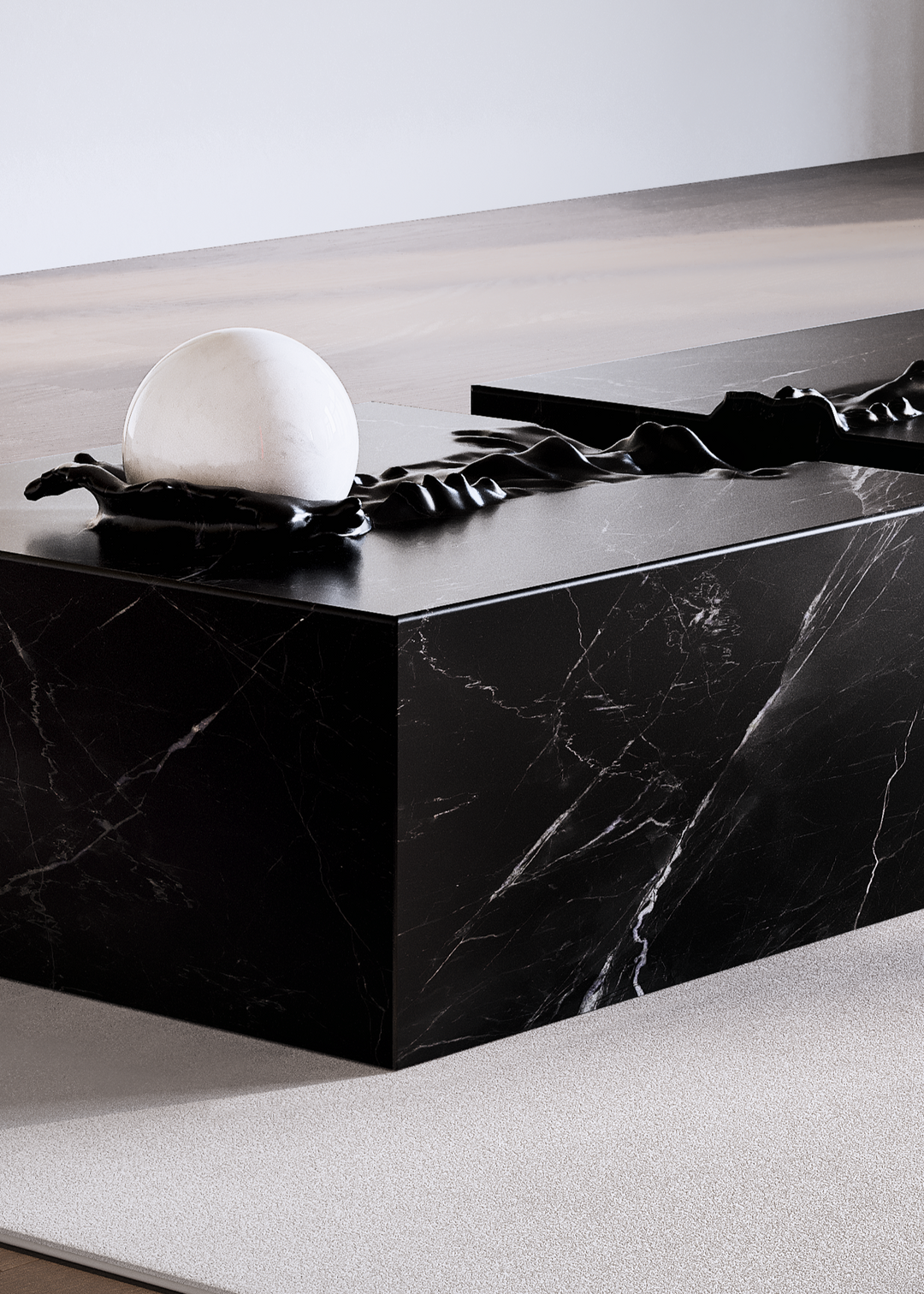 Duffy London Pearl Table sculptural marble coffee table with carved ripple effect and spherical pearl element, creating the illusion of water frozen in motion.
