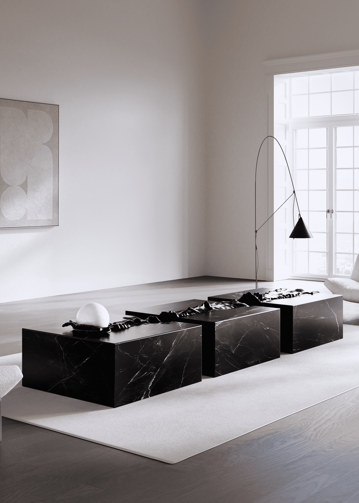 Duffy London Pearl Table sculptural marble coffee table with carved ripple effect and spherical pearl element, creating the illusion of water frozen in motion.