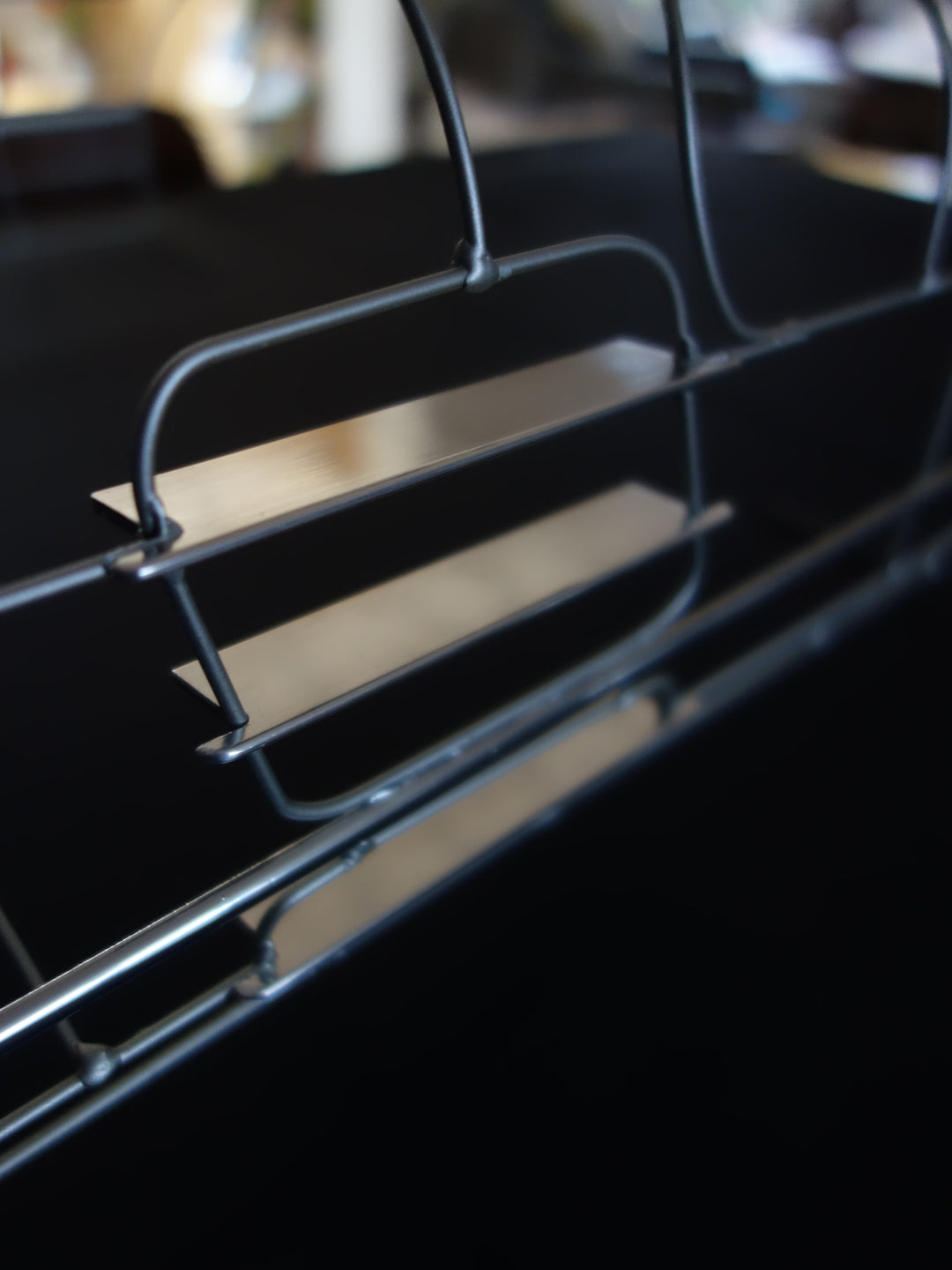 Handcrafted Mercedes-Benz 300 SLR Coupé wire sculpture by Chris Twitchell, inspired by the legendary 1955 Uhlenhaut prototype designed by Friedrich Geiger. Sculpted from precision-formed steel and finished in silver grey DB180, this wall-mounted piece reimagines one of the rarest and most valuable cars ever built — a celebration of German engineering excellence, aerodynamic form, and timeless automotive design.