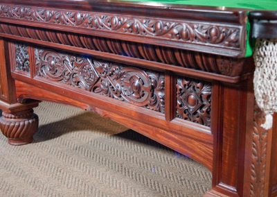 Orme & Sons Arts & Crafts billiard table c.1890 in flamed mahogany with intricate carved detailing and traditional green cloth.