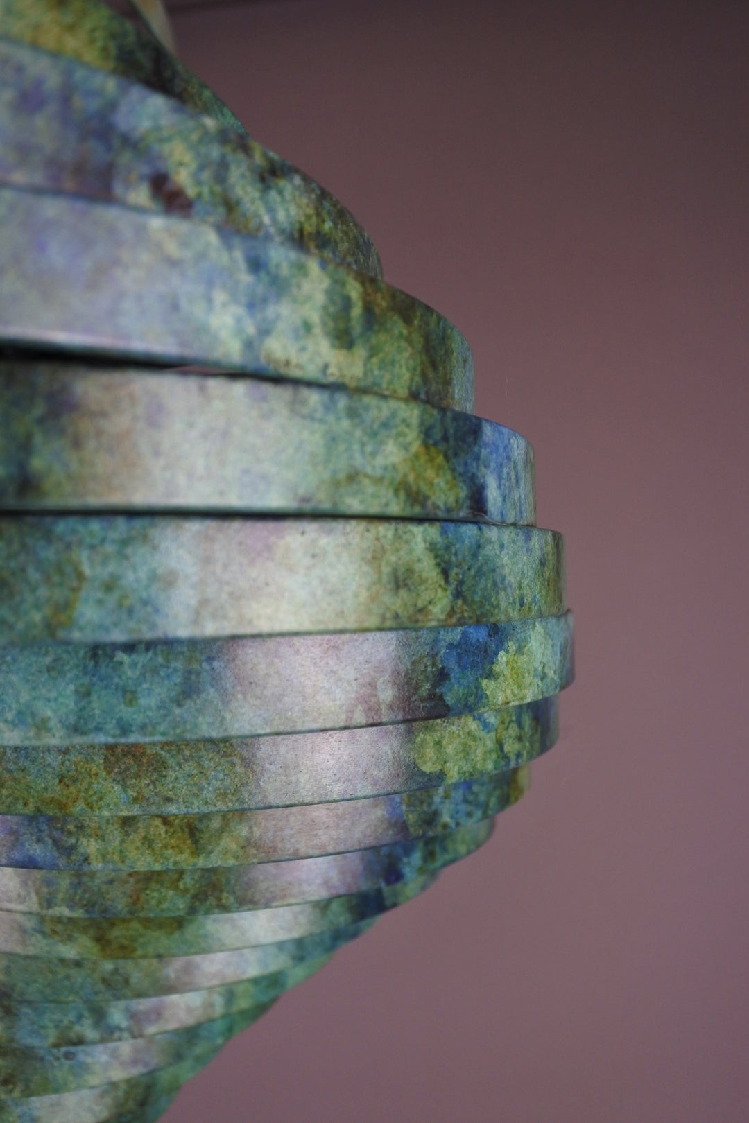 Vortex II by Thomas Joynes – a limited edition bronze sculpture with artisan patina, exploring Fibonacci-based forms through stacked, spiralling discs. The rich verdigris patina in green-blue and rust tones highlights the rhythmic, wave-like movement of the bronze layers. Mounted on a smooth Carrara marble base, the piece brings a sense of elegance and kinetic energy to any contemporary interior.