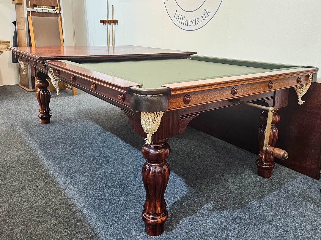 Sir William Bentley Billiards Empire 8ft wind-up table in mahogany with traditional turned legs and dual-purpose dining top, finished with green cloth.