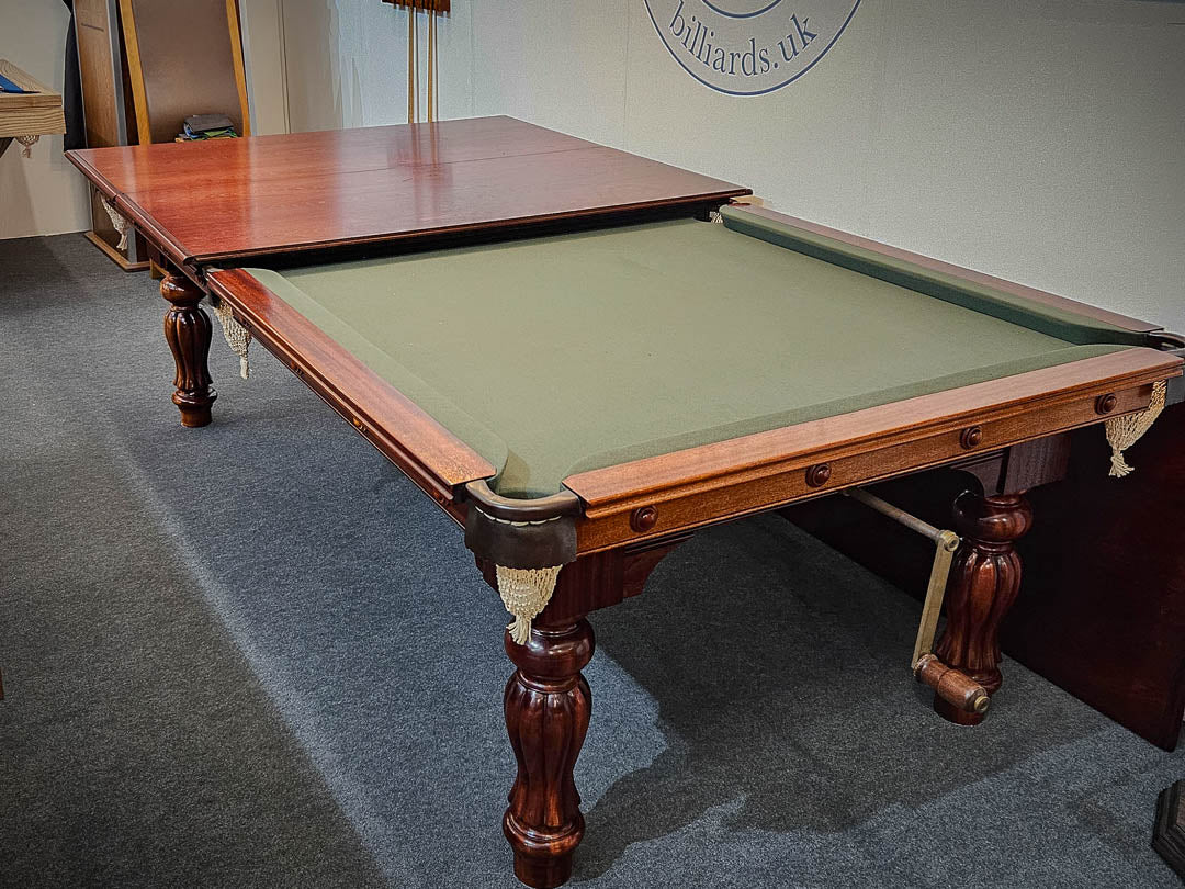 Sir William Bentley Billiards Empire 8ft wind-up table in mahogany with traditional turned legs and dual-purpose dining top, finished with green cloth.