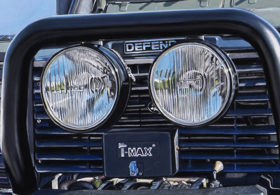 Pastel artwork depicting a Land Rover Defender viewed head-on, tightly framed to emphasise the grille, headlights, bull bar, winch and bonnet details, with worn paintwork, metal textures, glass reflections and subtle surface marks rendered in sharp hyper-realist detail against a clear blue sky.
