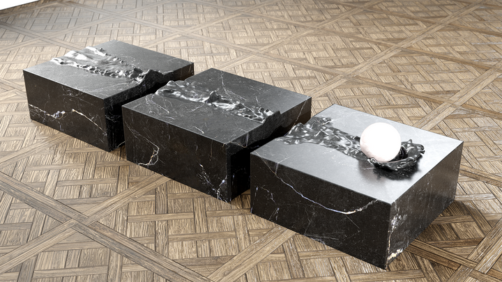 Duffy London Pearl Table sculptural marble coffee table with carved ripple effect and spherical pearl element, creating the illusion of water frozen in motion.