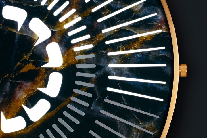“Tempus Emperor” by Ben Rousseau – a limited-edition illuminated wall timepiece crafted from black and gold marbled glass with brass-tinted aluminium and LEDs. A regal fusion of design, light, and luxury craftsmanship.

