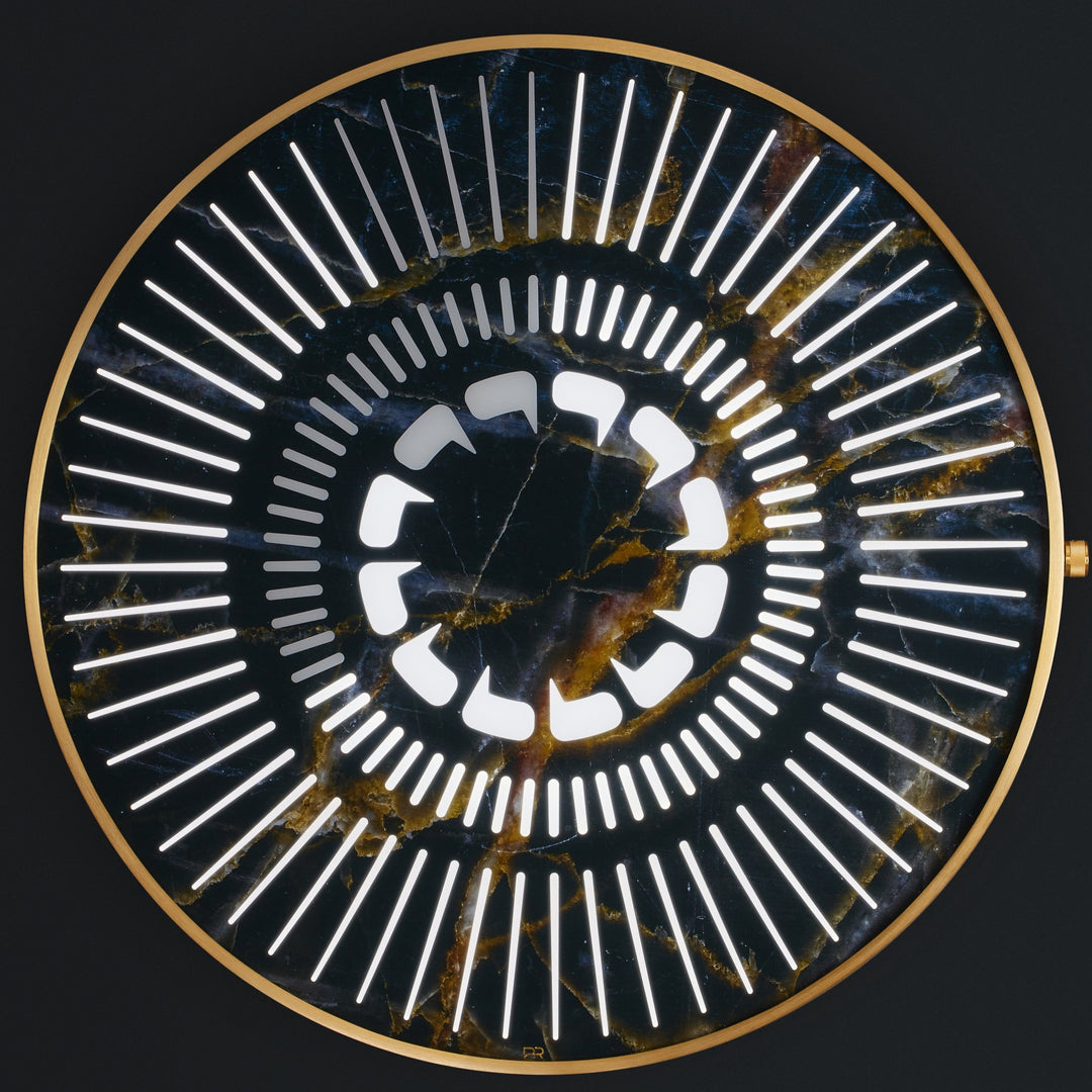 “Tempus Emperor” by Ben Rousseau – a limited-edition illuminated wall timepiece crafted from black and gold marbled glass with brass-tinted aluminium and LEDs. A regal fusion of design, light, and luxury craftsmanship.

