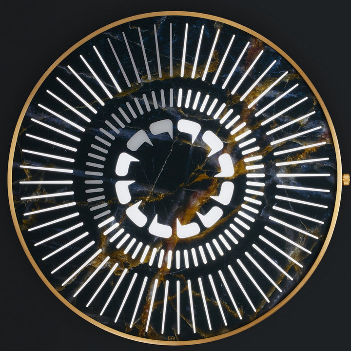 “Tempus Emperor” by Ben Rousseau – a limited-edition illuminated wall timepiece crafted from black and gold marbled glass with brass-tinted aluminium and LEDs. A regal fusion of design, light, and luxury craftsmanship.

