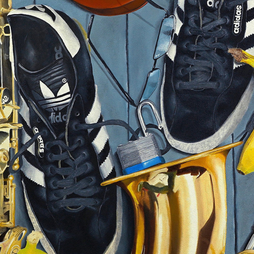 A highly detailed still-life oil painting featuring black Adidas trainers, a Venetian-style mask, saxophones, a violin, a glass Coca-Cola bottle, bananas, a cassette tape, and metal handcuffs arranged in a dense composition with reflective brass, polished wood, textured leather, and bright colour accents.