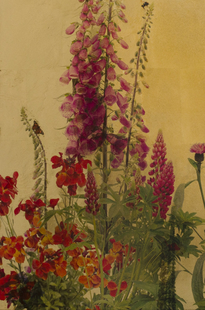 Robert Pereira Hind’s Fera Lupinis, a vibrant mixed media artwork from the Out of Eden series, depicting a summer garden in full bloom. Tall pink foxgloves, vivid lupins, and scarlet flowers rise against a luminous gold-leaf background, alive with bees and butterflies. Created using acrylic paint and organic photographic pigment on a gilded wooden panel, finished with shellac and art glazes, the work is designed to naturally oxidise over decades—developing a rich patina that enhances its warmth and depth.