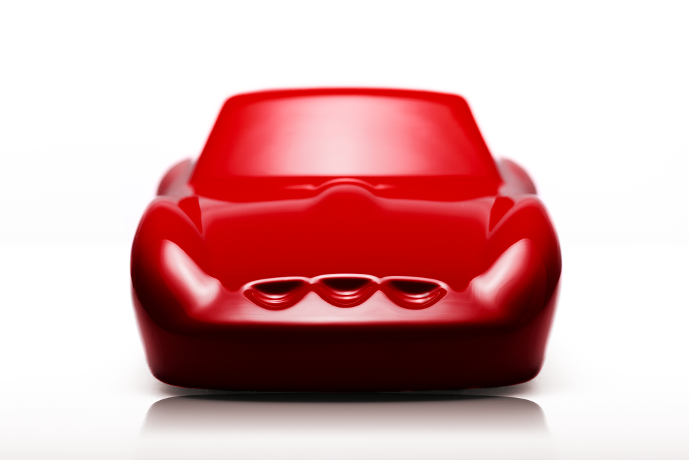 ‘Ferrari 250 GTO’ by Sreeni Gandra, a limited-edition contemporary automotive sculpture from the Forme di Velocità series, inspired by the iconic Ferrari 250 GTO designed by Sergio Scaglietti. Presented in a striking high-gloss Rosso Corsa red finish, the sculpture captures the car's flowing aerodynamic silhouette, elongated bonnet, sculpted wheel arches, distinctive triple front air intakes and elegant fastback roofline. Its smooth, minimalist surfaces celebrate the pure form and timeless character of one 