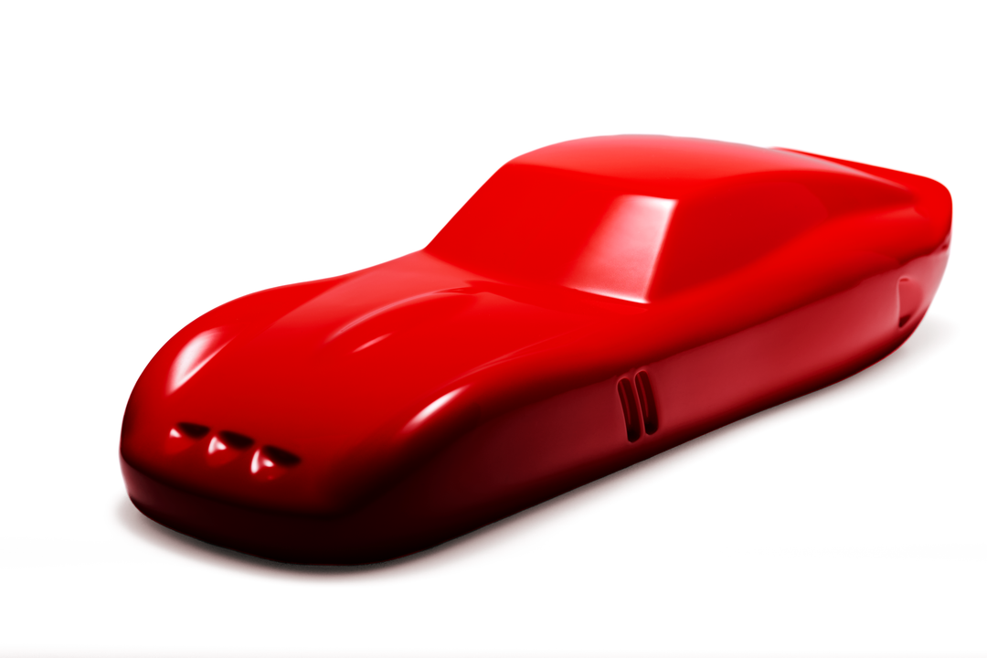 ‘Ferrari 250 GTO’ by Sreeni Gandra, a limited-edition contemporary automotive sculpture from the Forme di Velocità series, inspired by the iconic Ferrari 250 GTO designed by Sergio Scaglietti. Presented in a striking high-gloss Rosso Corsa red finish, the sculpture captures the car's flowing aerodynamic silhouette, elongated bonnet, sculpted wheel arches, distinctive triple front air intakes and elegant fastback roofline. Its smooth, minimalist surfaces celebrate the pure form and timeless character of one 