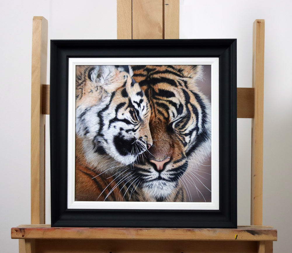 Close-up painting of two tigers nuzzling affectionately, showcasing their detailed fur and facial features.