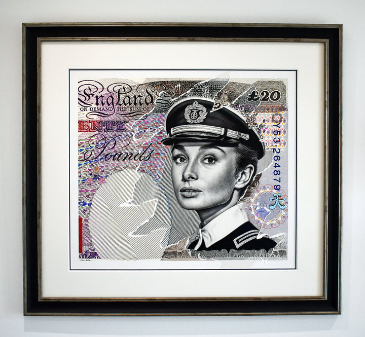 Contemporary artwork reimagining a £20 banknote featuring a poised Audrey Hepburn in a naval officer’s uniform, rendered in photorealistic detail with layered currency motifs using biro.