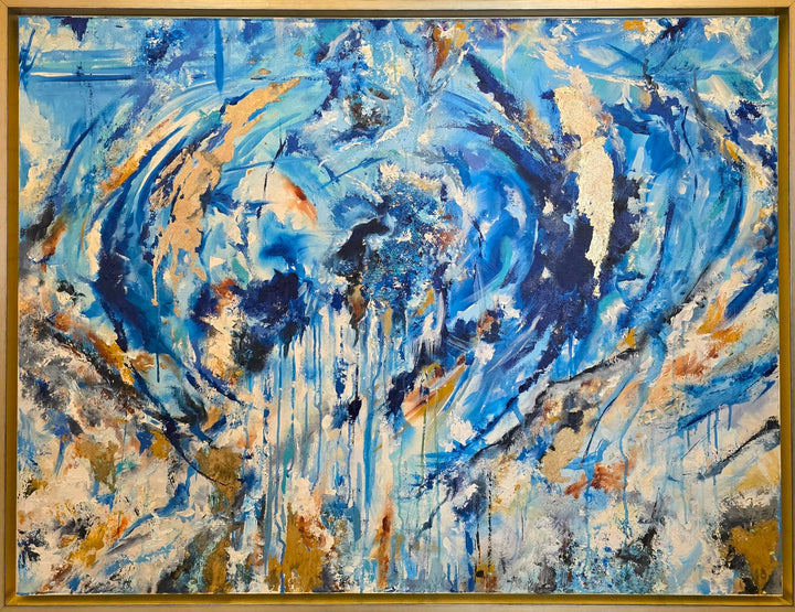 Highly textured blue and gold abstract painting with sweeping circular motion, cascading drips and layered brushstrokes, evoking water, movement and freedom, framed in a gold tray frame.