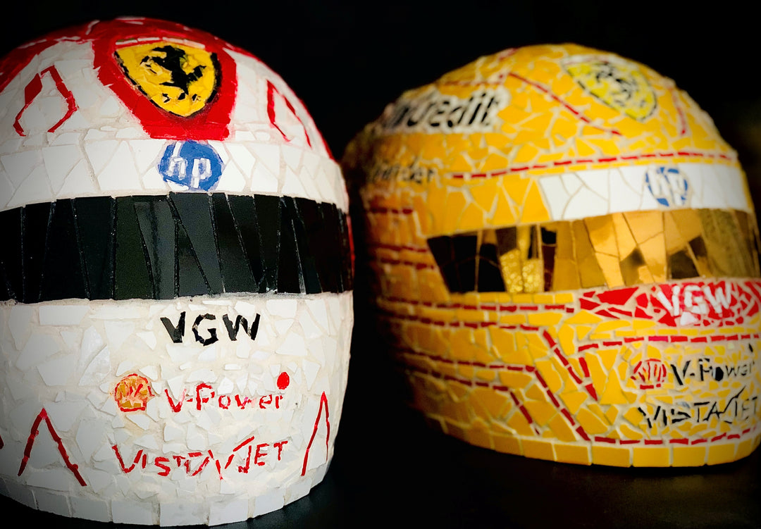 Full-size Ferrari-inspired Formula 1 helmet mosaic sculpture, handcrafted from individually cut ceramic tiles in red, yellow, white, black, and metallic gold. This bespoke artwork captures the energy and precision of motorsport design, created as an example of a custom commission.