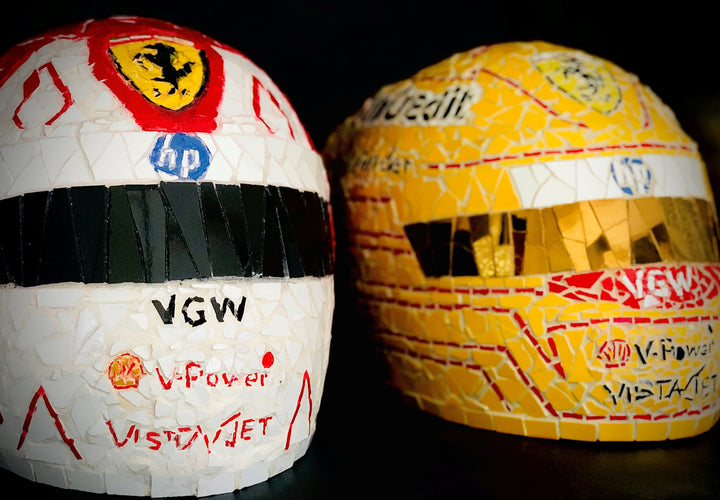 Full-size Ferrari-inspired Formula 1 helmet mosaic sculpture, handcrafted from individually cut ceramic tiles in red, yellow, white, black, and metallic gold. This bespoke artwork captures the energy and precision of motorsport design, created as an example of a custom commission.
