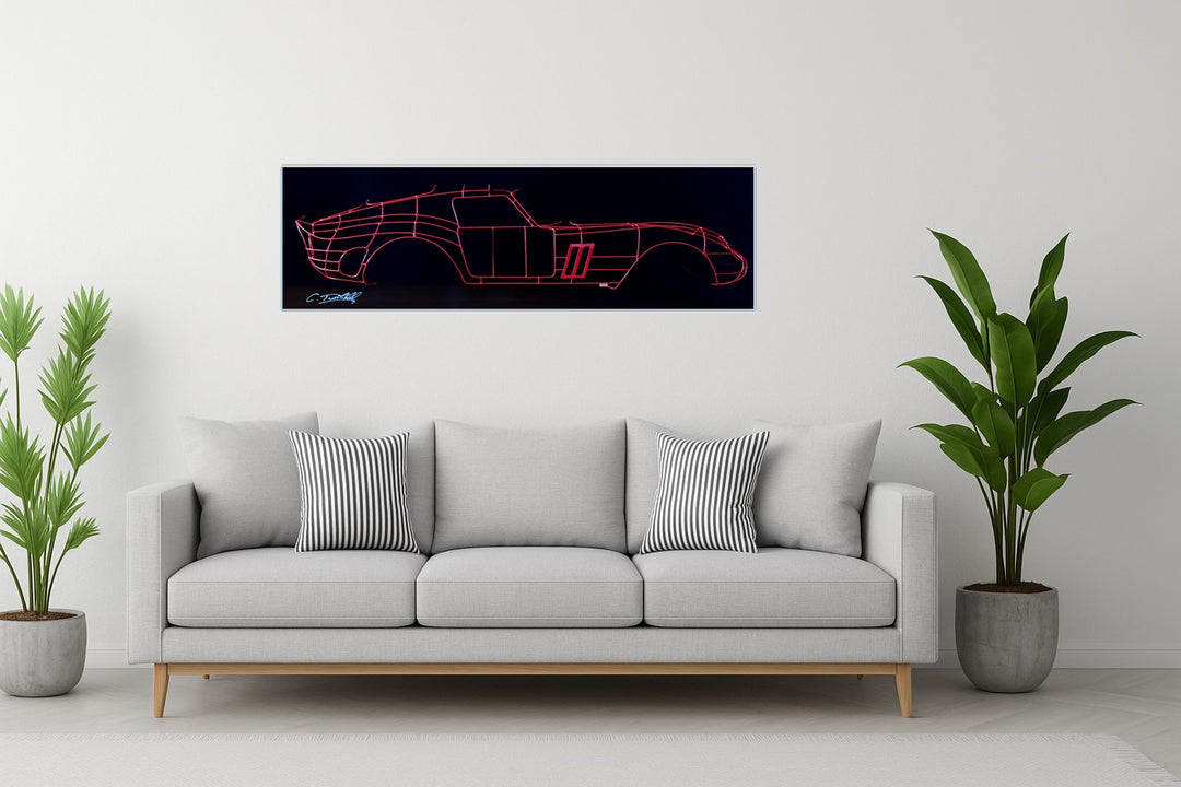 Handcrafted Ferrari 250 GTO wire sculpture by Chris Twitchell, capturing the elegant profile of the legendary 1962 Series 1 Scaglietti body. Finished in Rosso Chiaro red and mounted on a sleek black panel, this sculptural study reimagines the original Maranello buck in minimalist wire form — a fusion of precision engineering, Italian design, and contemporary British craftsmanship.