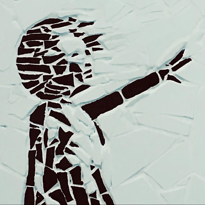 “Girl with Balloon” mosaic — a handcrafted ceramic tile artwork reimagining the iconic heart balloon image. Featuring black and white tiles with a vivid red heart, this bespoke commission blends street art symbolism with fine mosaic craftsmanship.