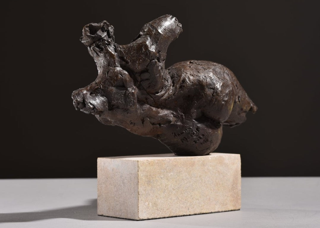 ‘Nude Emergence Torso’ by Hamish Mackie, a limited-edition contemporary bronze figurative sculpture depicting a fragmented reclining female nude torso. Inspired by ancient sculptural artefacts, the abstracted human form features rough, expressive modelling, weathered surfaces and an earthy brown bronze patina. Mounted horizontally on a rectangular Ancaster Weatherbed stone plinth, the sculpture explores the natural beauty and tactile qualities of the female form.