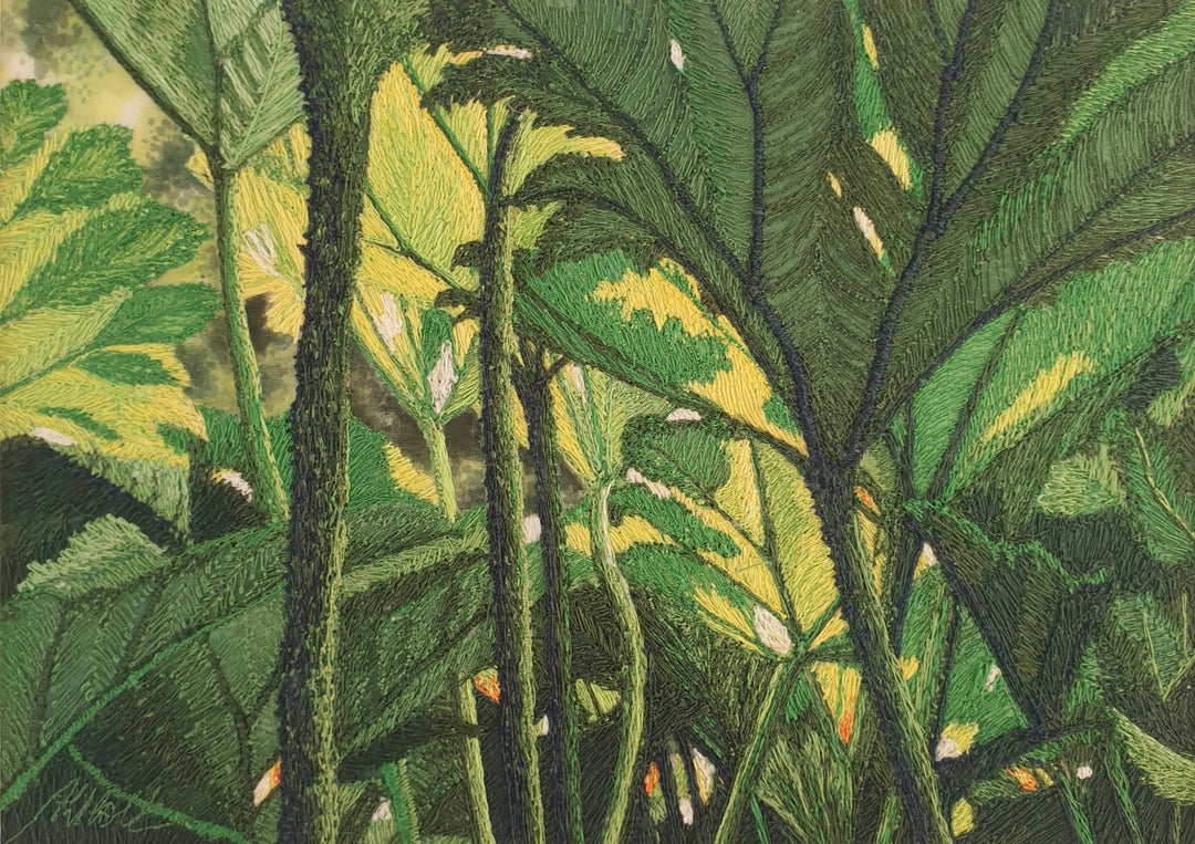 Dense embroidered scene of tropical foliage with overlapping green and yellow leaves viewed from beneath a lush canopy.
