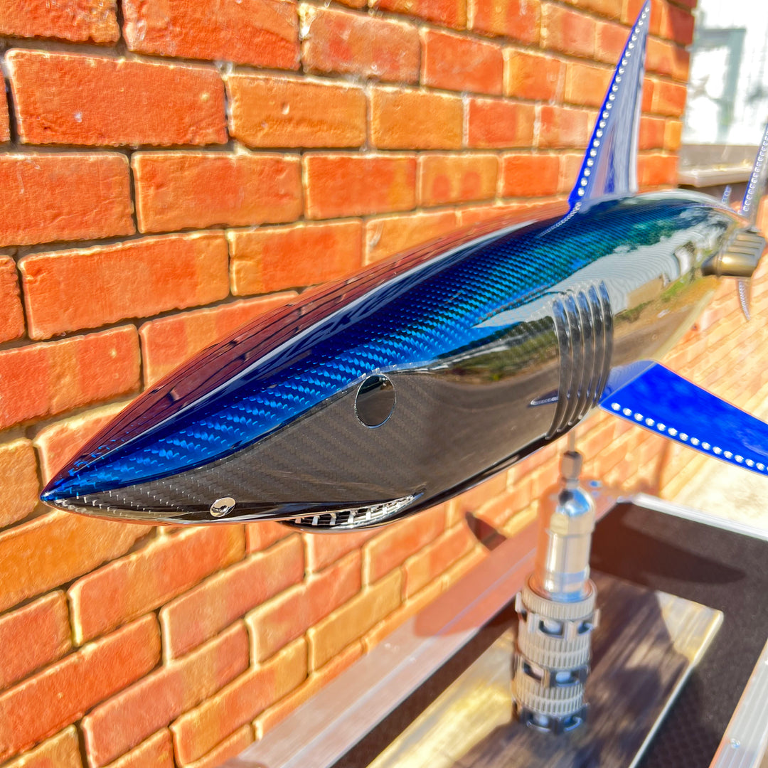 Alastair Gibson CarbonArt45 carbon fibre mako shark sculpture with aluminium fins and Formula One components, aerodynamic contemporary design
