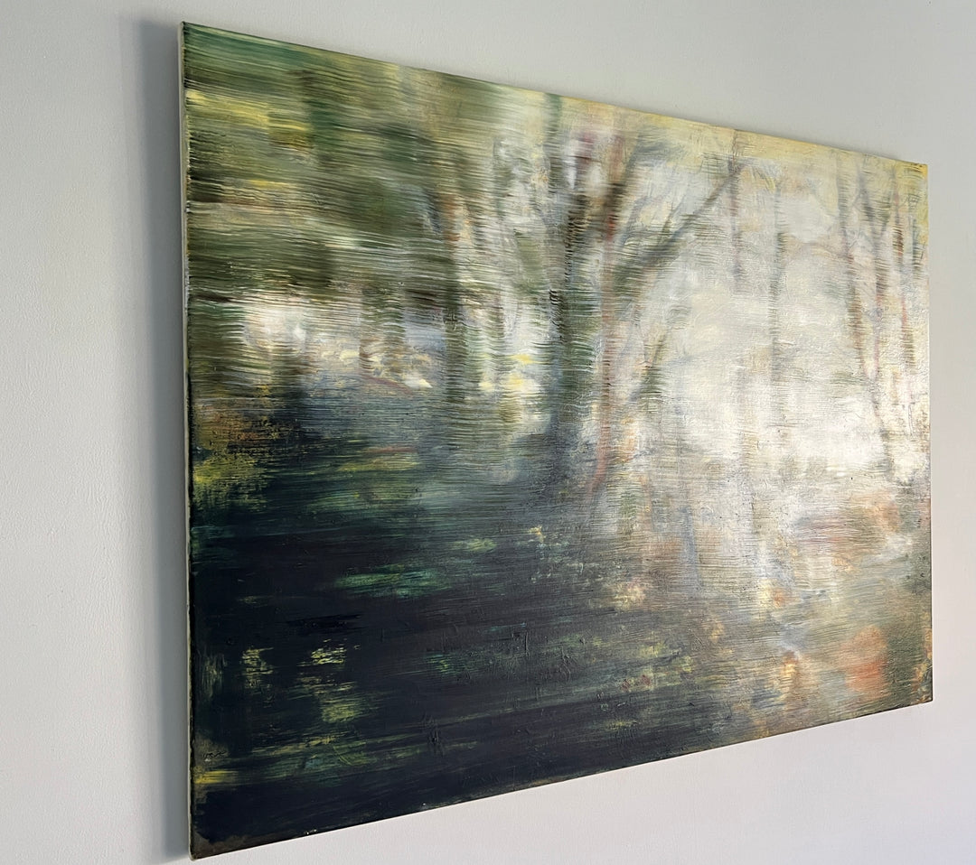 Abstract forest landscape in soft focus, with blurred trees and earthy tones fading into light.