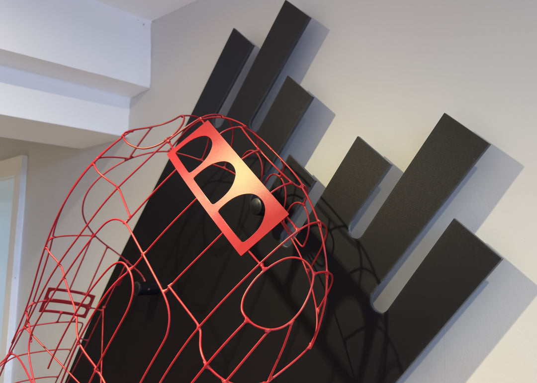 Handcrafted red wire sculpture of the Ferrari 250 GTO by Chris Twitchell, inspired by the original coachbuilder’s buck used to form the legendary 1962 Series 1 body. Finished in Rosso Chiaro red, this intricate wall-mounted artwork captures the elegance, form, and aerodynamics of Scaglietti’s design through sculptural craftsmanship and precision engineering.