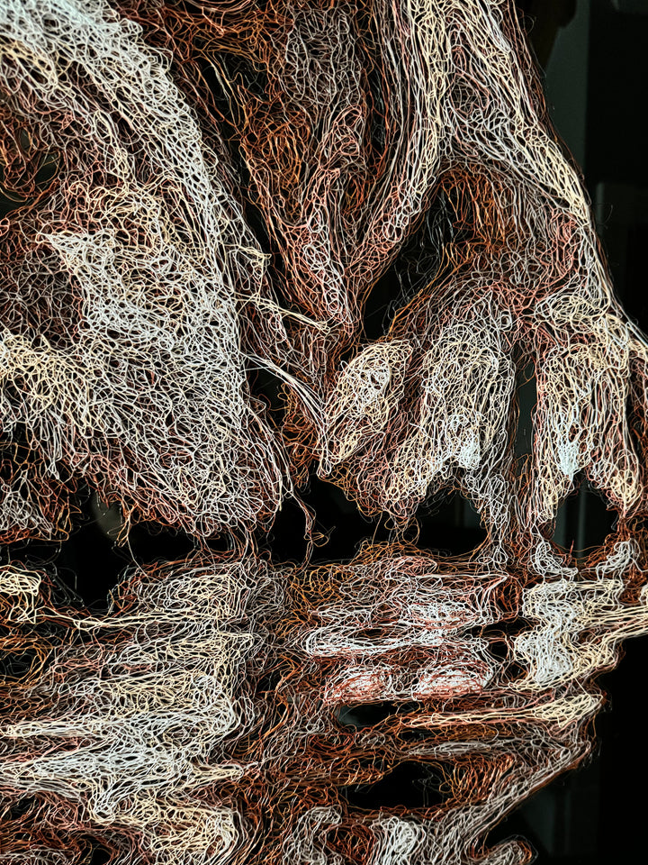 Vibrant injected-scribble artwork of a bulldog puppy resting at the edge of rippling water, its reflection distorted in swirling tones of white, tan, copper and brown, with dense textured linework creating a three-dimensional, energetic surface.