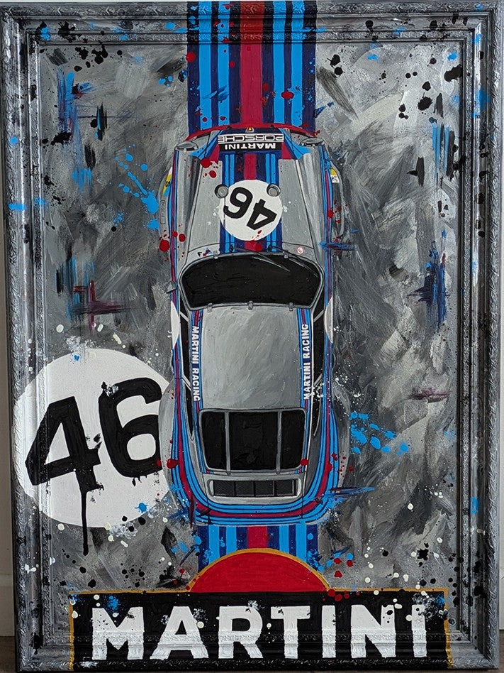Original painting of a 1973 Porsche 911 Carrera 3.0 RSR in Martini Racing livery, shown from a top-down view with bold racing stripes and number 46, set against a textured abstract grey background and framed in a custom-painted frame.