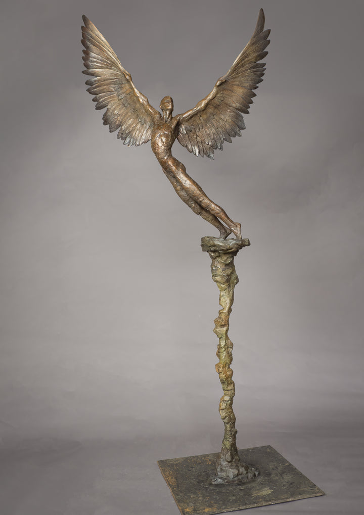 “Icarus IX” by Nicola Godden – a limited edition bronze sculpture depicting Icarus rising skyward, wings outstretched in a gesture of freedom and ascent. Cast in warm bronze tones with sunlit patina, handmade in England, edition of nine.