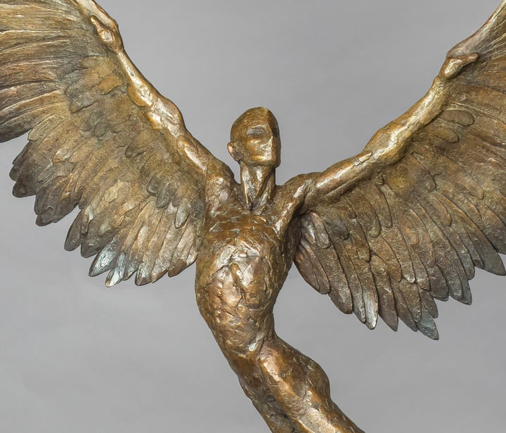 “Icarus IX” by Nicola Godden – a limited edition bronze sculpture depicting Icarus rising skyward, wings outstretched in a gesture of freedom and ascent. Cast in warm bronze tones with sunlit patina, handmade in England, edition of nine.