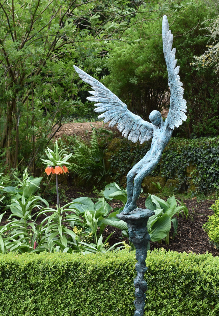 “Icarus X” by Nicola Godden – a limited edition bronze sculpture depicting Icarus falling from the sky, his wings extended in descent. Cast with a blue ocean-inspired patina, this handmade British bronze captures both tragedy and grace.