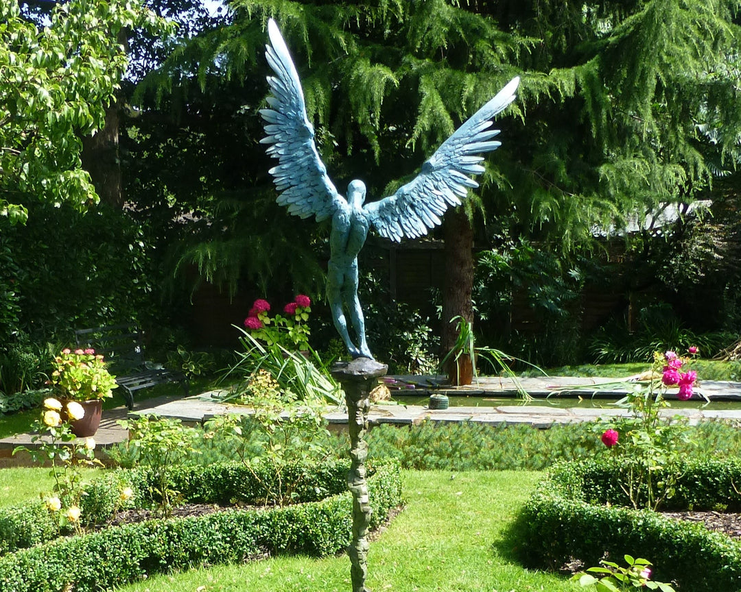 “Icarus X” by Nicola Godden – a limited edition bronze sculpture depicting Icarus falling from the sky, his wings extended in descent. Cast with a blue ocean-inspired patina, this handmade British bronze captures both tragedy and grace.
