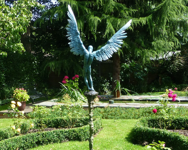 “Icarus X” by Nicola Godden – a limited edition bronze sculpture depicting Icarus falling from the sky, his wings extended in descent. Cast with a blue ocean-inspired patina, this handmade British bronze captures both tragedy and grace.