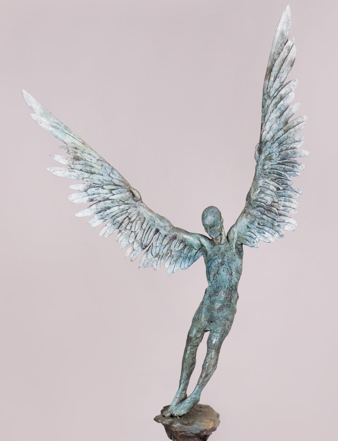 “Icarus X” by Nicola Godden – a limited edition bronze sculpture depicting Icarus falling from the sky, his wings extended in descent. Cast with a blue ocean-inspired patina, this handmade British bronze captures both tragedy and grace.