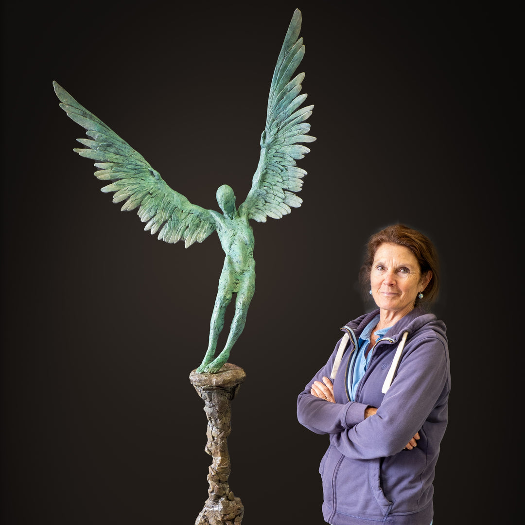 “Icarus X” by Nicola Godden – a limited edition bronze sculpture depicting Icarus falling from the sky, his wings extended in descent. Cast with a blue ocean-inspired patina, this handmade British bronze captures both tragedy and grace.