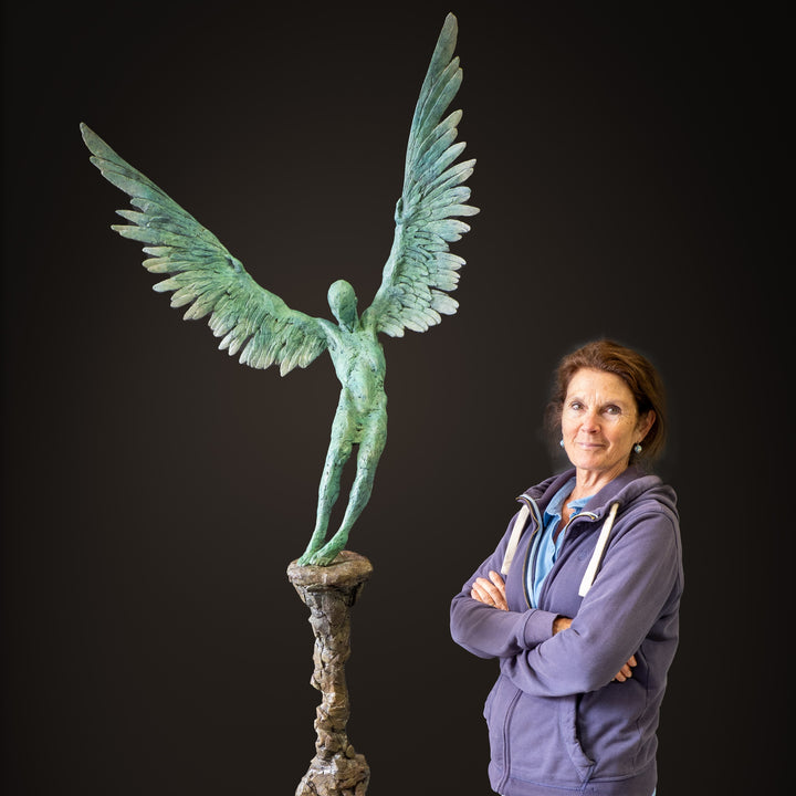 “Icarus X” by Nicola Godden – a limited edition bronze sculpture depicting Icarus falling from the sky, his wings extended in descent. Cast with a blue ocean-inspired patina, this handmade British bronze captures both tragedy and grace.