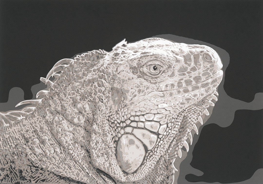 Hand-cut paper artwork of an iguana, showcasing its intricate scales and textured ridges in layered tones of ivory, taupe, and soft grey. Each scale is individually cut, creating a strikingly lifelike, prehistoric presence against a deep charcoal background.