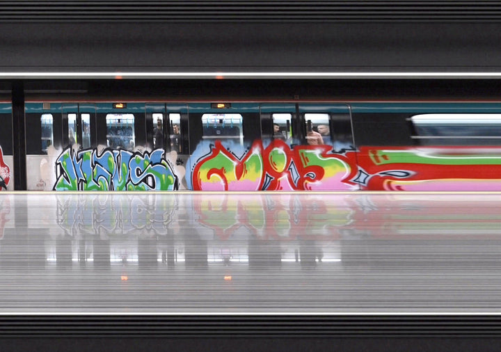 A sequence of digitally reconstructed images capturing Istanbul’s metro commuters in motion against vividly striped and graffiti-covered train carriages—where bodies blur into streaks of colour, revealing the rhythm of a city suspended between tradition and hyper-modernity.