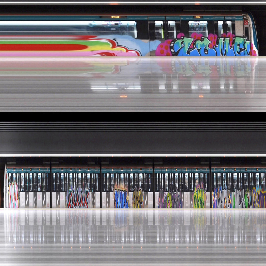A sequence of digitally reconstructed images capturing Istanbul’s metro commuters in motion against vividly striped and graffiti-covered train carriages—where bodies blur into streaks of colour, revealing the rhythm of a city suspended between tradition and hyper-modernity.